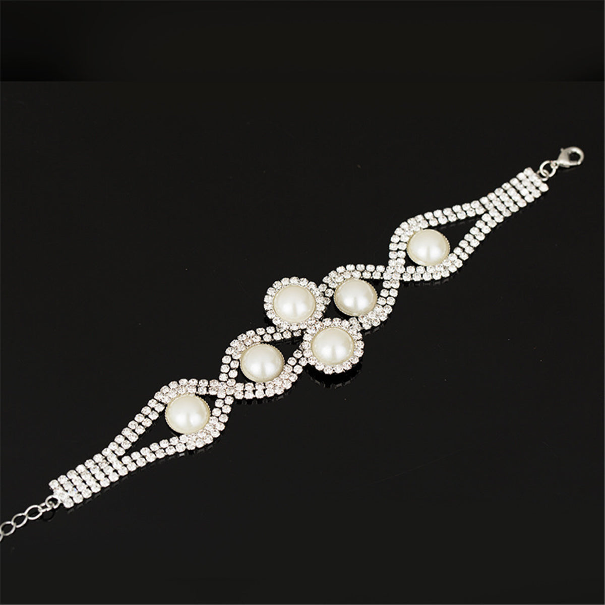 Pearl and Cubic Zirconia Silver-Plated Crossing Bracelet, silver bracelet for women, everyday style, front view