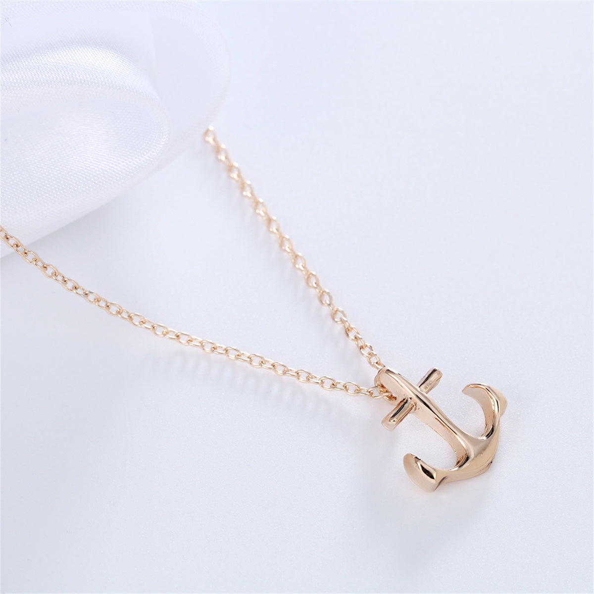 Dazzling 18K gold-plated anchor necklace with a petite chain, a perfect blend of elegance and nautical charm.