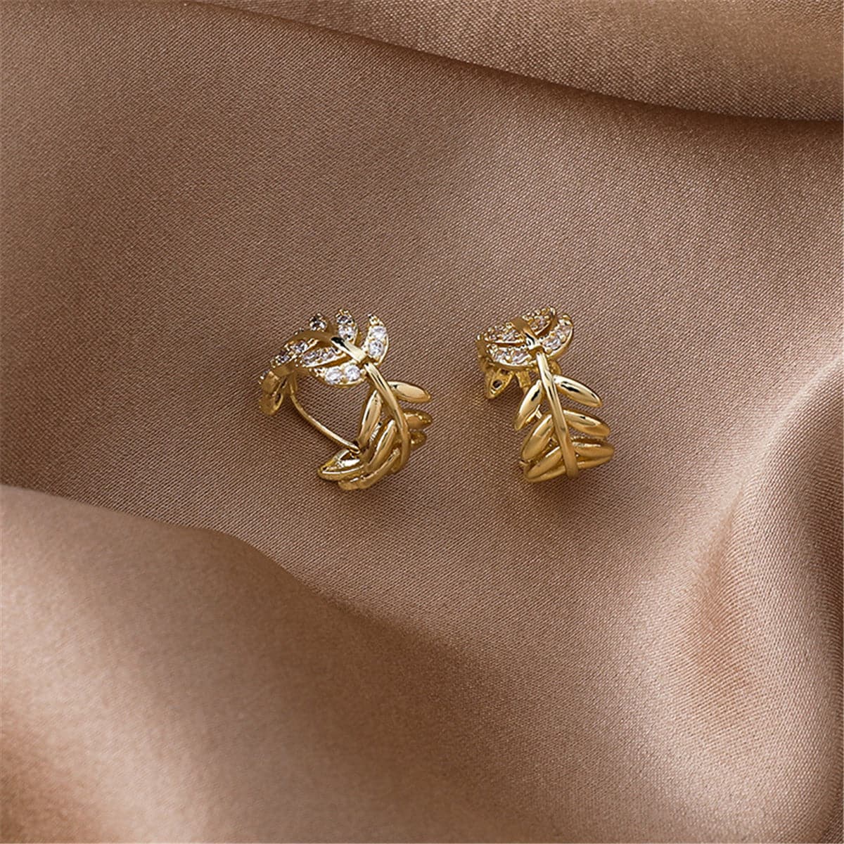 Cubic Zirconia and 18K Gold-Plated Leaf Huggie Earrings, gold huggie earrings, botanical inspired, lifestyle look