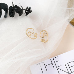 Chic 18K gold-plated abstract face stud earrings with captivating eyes, a must-have accessory for any jewelry lover.