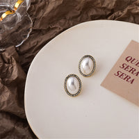 Cubic Zirconia & Pearl Oval Halo Stud Earrings