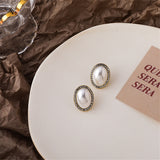 Cubic Zirconia & Pearl Oval Halo Stud Earrings