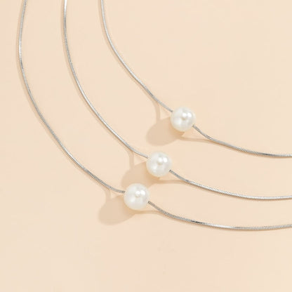 Pearl and Silver-Plated Layered Necklace Set, jewelry gift sets for women, vintage-inspired design, detail close-up