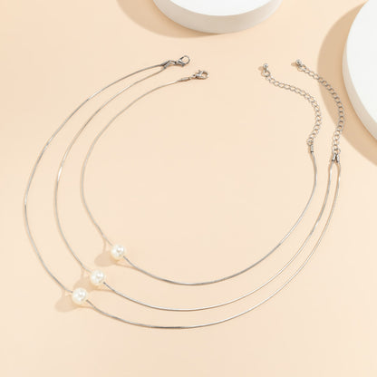 Pearl and Silver-Plated Layered Necklace Set, jewelry gift sets for women, vintage-inspired design, styled look