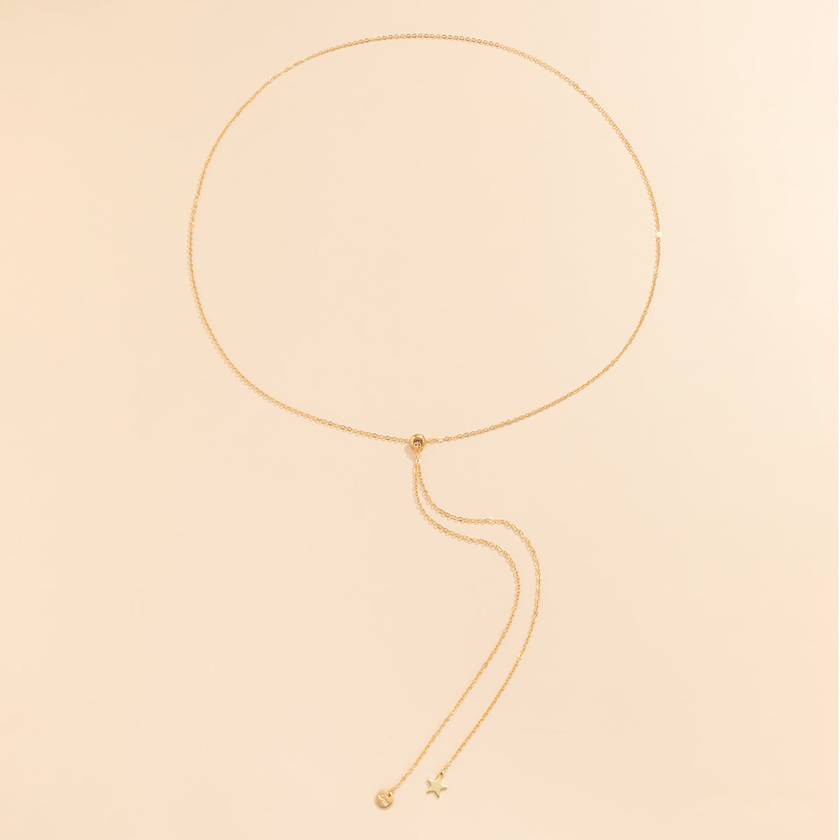 Beautiful 18K gold-plated waist chain showcasing a long chain and a small 'Love' star pendant, ideal for adding flair.
