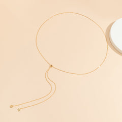 Chic 18K gold-plated waist chain with a long chain and a petite 'Love' star pendant, elevating your fashion game effortlessly.
