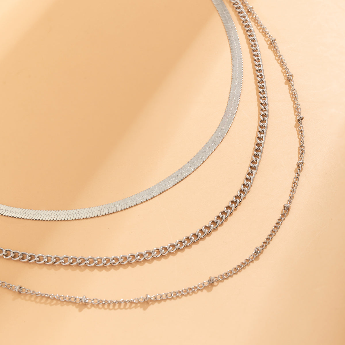 Silver-Plated Snake Chain Layered Necklace, silver pendant necklace for women, botanical inspired, detail close-up
