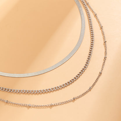 Silver-Plated Snake Chain Layered Necklace, silver pendant necklace for women, botanical inspired, detail close-up