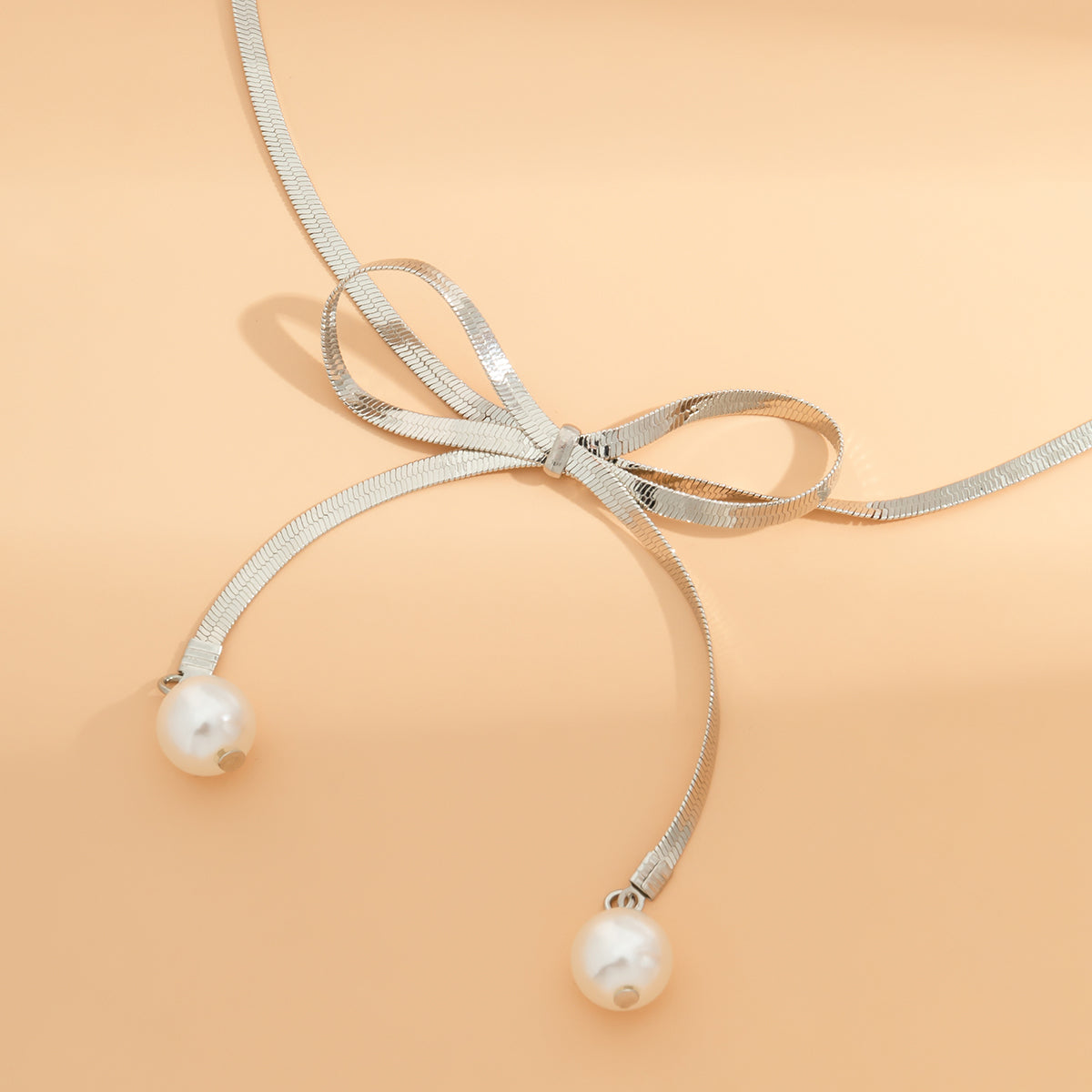 Silver-Plated and Pearl Bow Choker Necklace, silver pendant necklace for women, everyday style, lifestyle look