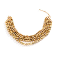 Stunning 18K gold-plated statement necklace with a beautiful arrangement of golden beads and a chic chain design.