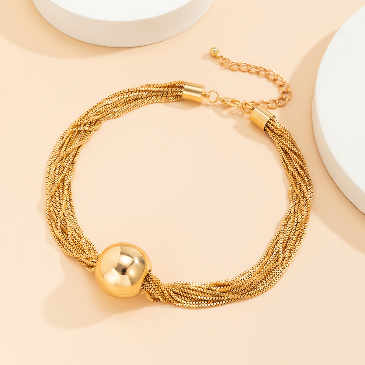 Stunning golden ball chain necklace, crafted in 18K gold plating, designed as a fashionable multi-chain collar.