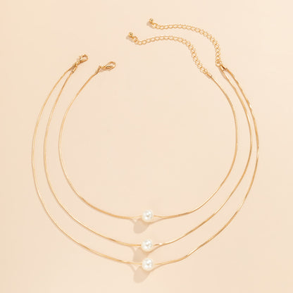 Pearl and 18K Gold-Plated Layered Necklace Set, jewelry gift sets for women, dainty minimalist design, detail close-up