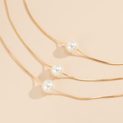 Pearl and 18K Gold-Plated Layered Necklace Set, jewelry gift sets for women, dainty minimalist design, lifestyle look