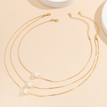 Pearl and 18K Gold-Plated Layered Necklace Set, jewelry gift sets for women, dainty minimalist design, styled look