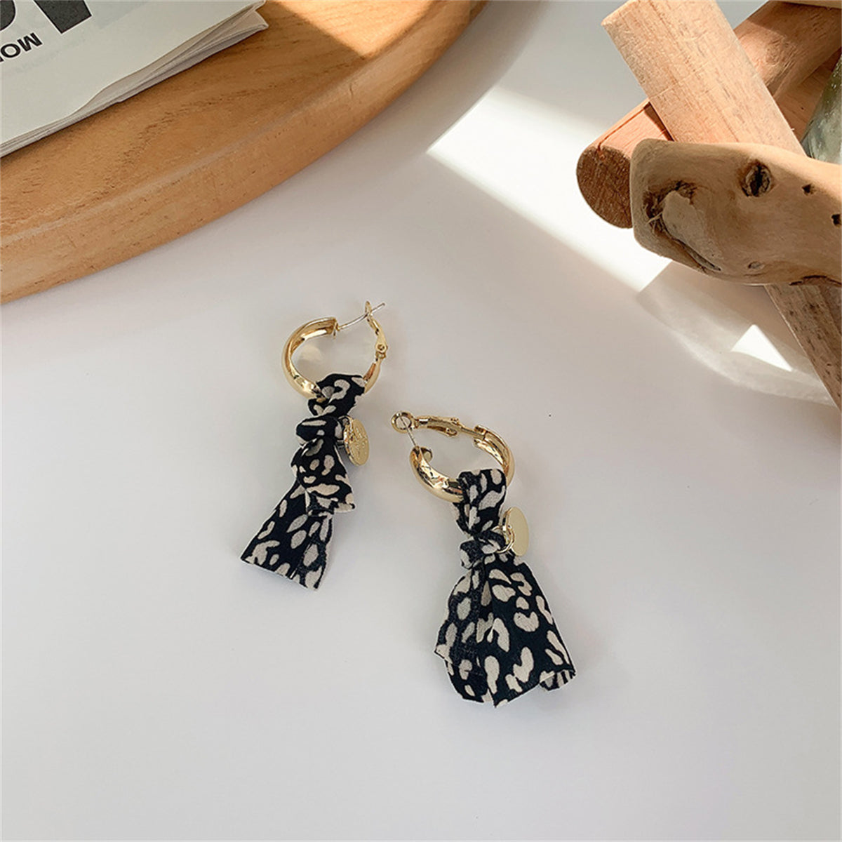 Black and 18K Gold-Plated Leopard Knot-Accent Drop Earrings, gold drop earrings for women, elegant gift for her, front view