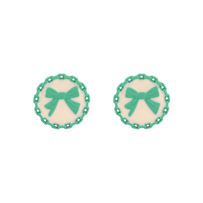 Green and White Bow Stud Earrings, stud earrings for women, vintage-inspired design, side view