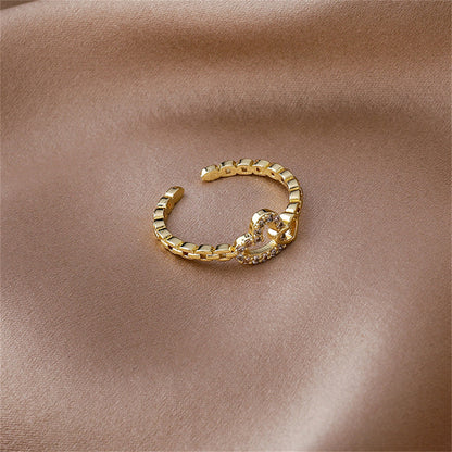 Cubic Zirconia and 18K Gold-Plated Pavé Interlocked Open Heart Chain Ring, gold statement rings for women, styled look