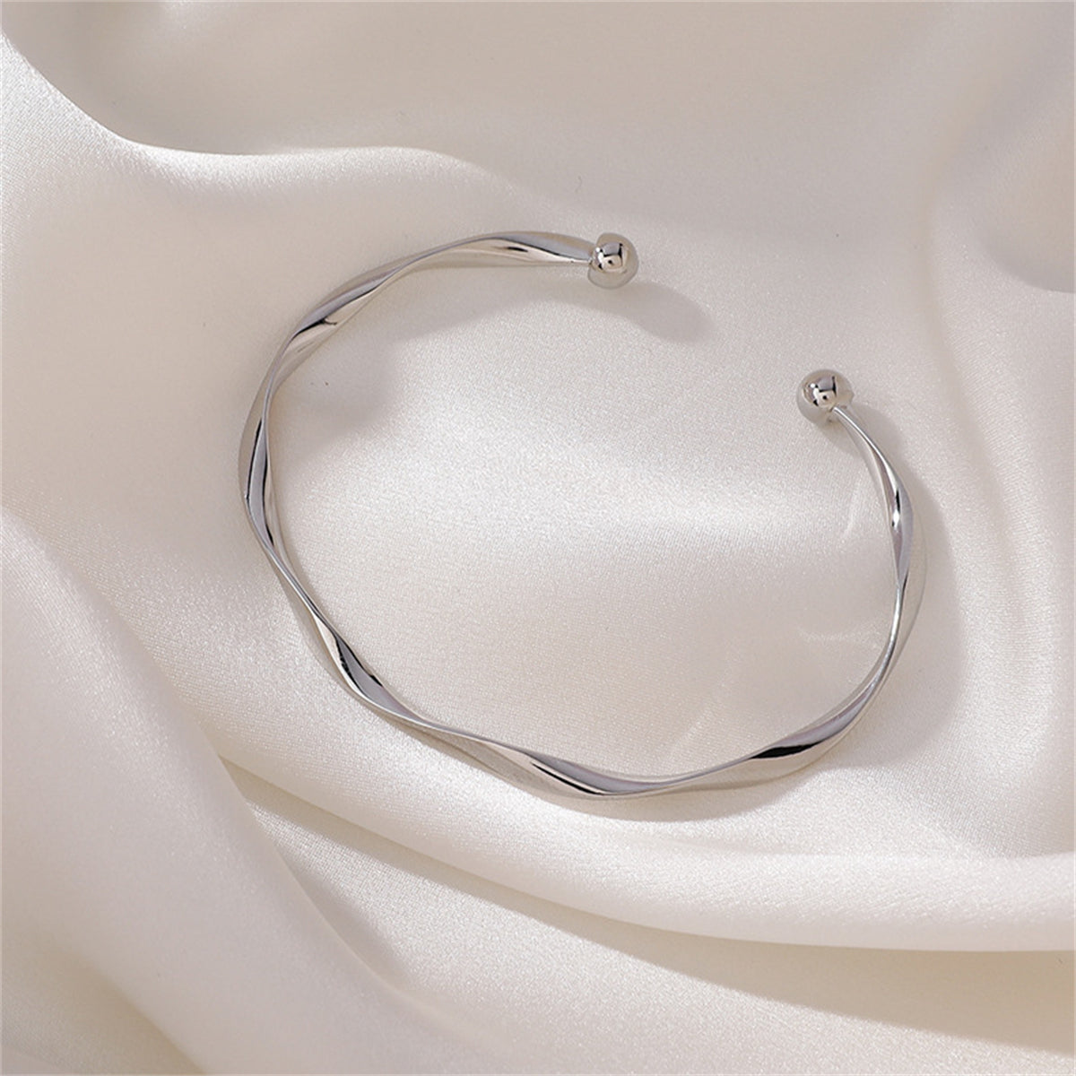Silver-Plated Curved Waves Cuff, silver bracelet for women, vintage-inspired design, side view