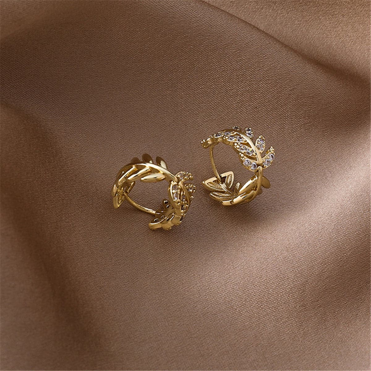 Cubic Zirconia and 18K Gold-Plated Leaf Huggie Earrings, gold huggie earrings, botanical inspired, styled look