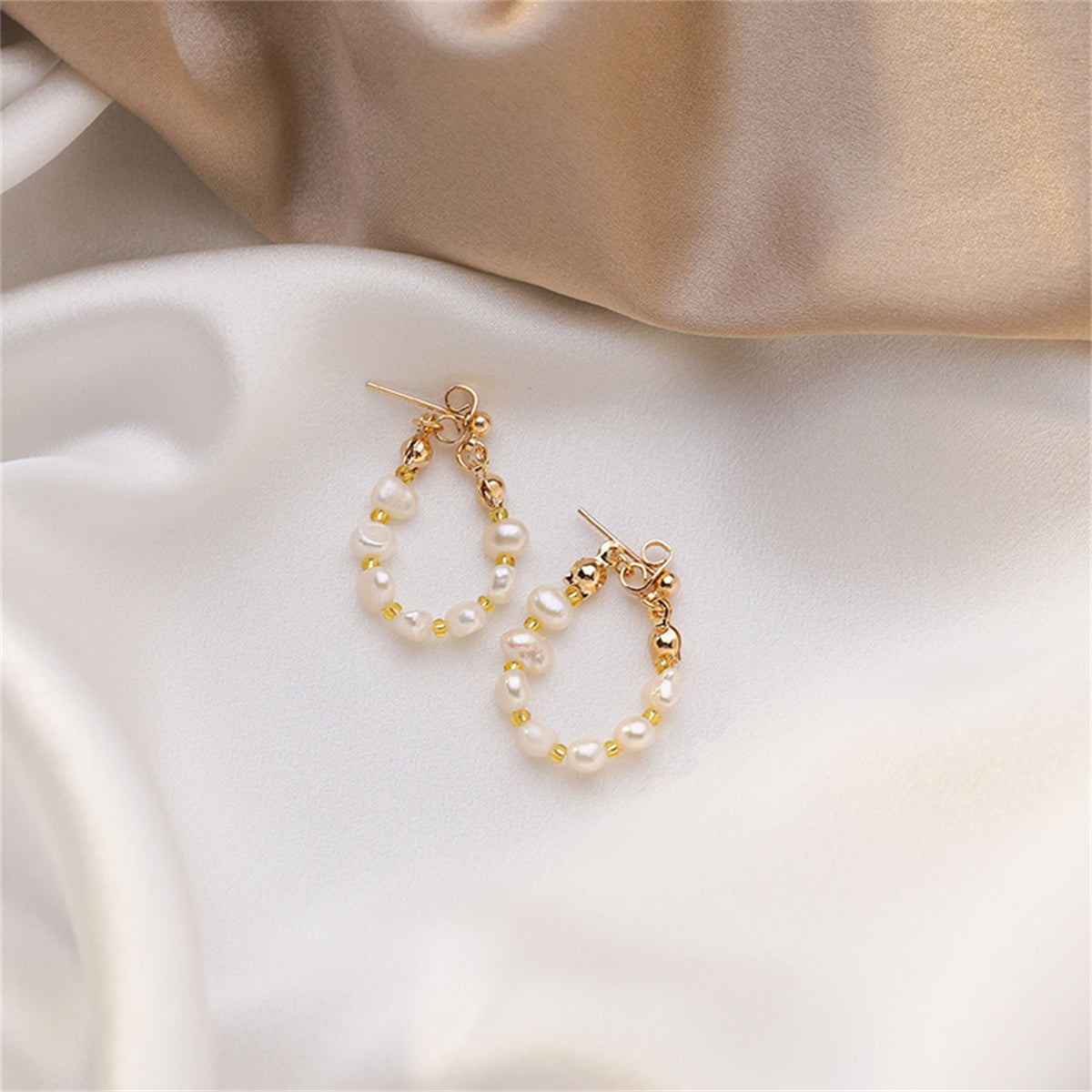 Pearl and 18K Gold-Plated Teardrop Ear Jackets, gold drop earrings for women, dainty minimalist design, styled look