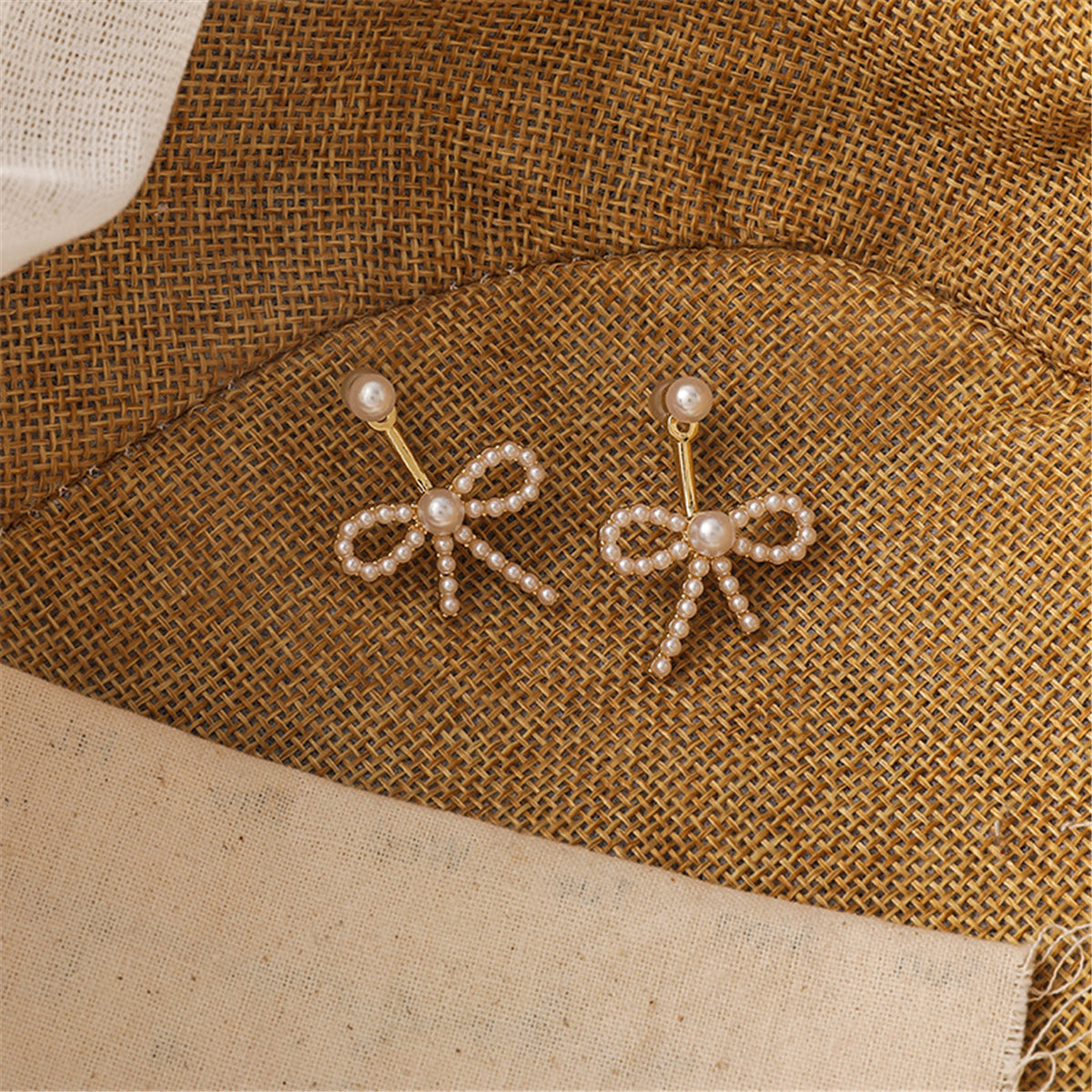 Pearl and 18K Gold-Plated Bow Ear Jackets, gold drop earrings for women, everyday style, styled look