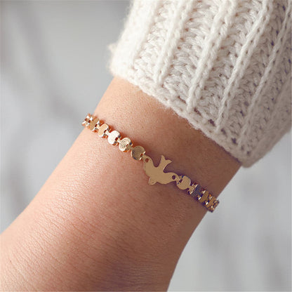 18K Gold-Plated Bird Bracelet, gold bracelet for women, botanical inspired, front view