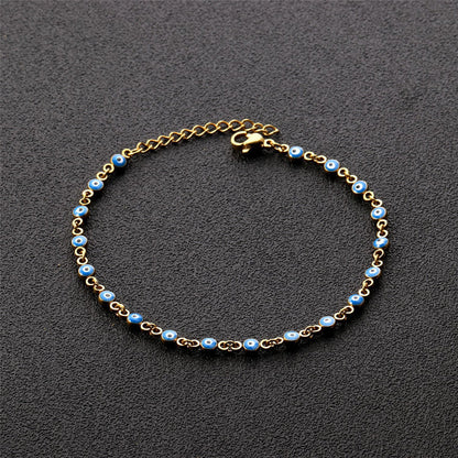 Blue Enamel and 18K Gold-Plated Eye Station Bracelet, gold bracelet for women, vintage-inspired design, detail close-up
