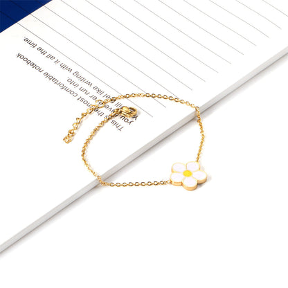 White Enamel and 18K Gold-Plated Flower Charm Bracelet, gold bracelet for women, botanical inspired, detail close-up