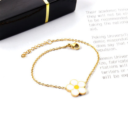 White Enamel and 18K Gold-Plated Flower Charm Bracelet, gold bracelet for women, botanical inspired, lifestyle look