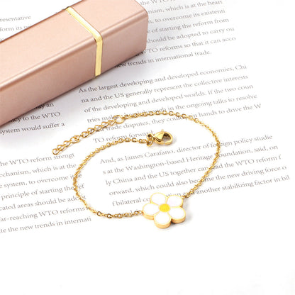 White Enamel and 18K Gold-Plated Flower Charm Bracelet, gold bracelet for women, botanical inspired, side view