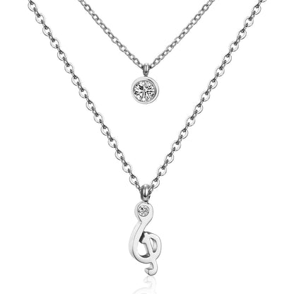 Cubic Zirconia and Silver-Plated Clef Note Layered Pendant Necklace, silver pendant necklace for women, front view