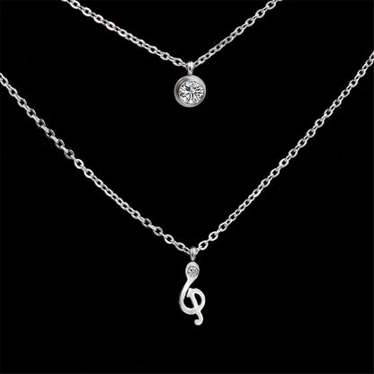 Cubic Zirconia and Silver-Plated Clef Note Layered Pendant Necklace, silver pendant necklace for women, detail close-up