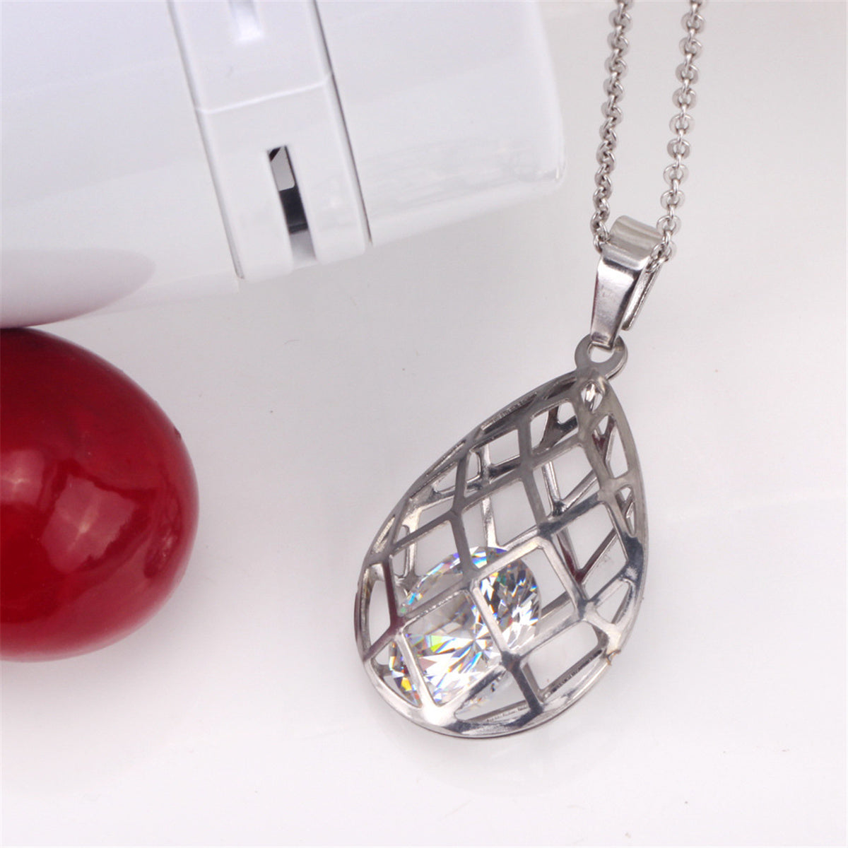 Clear Cubic Zirconia and Silver-Plated Caged Drop Earrings and Pendant Necklace, silver drop earrings for women, side view