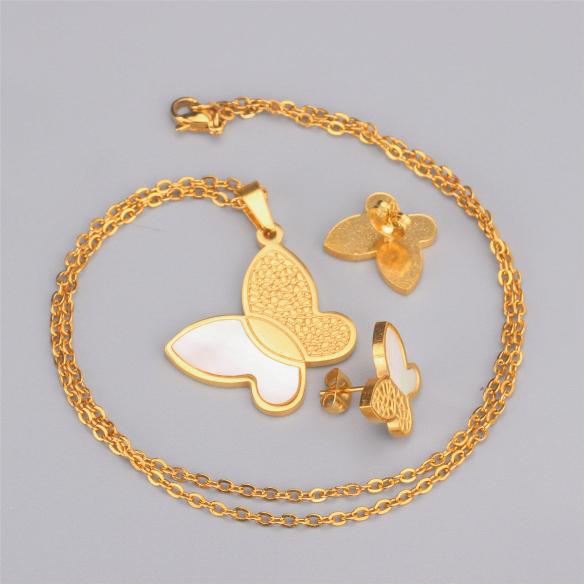 White Shell and 18K Gold-Plated Butterfly Stud Earrings and Pendant Necklace, gold stud earrings for women, lifestyle look