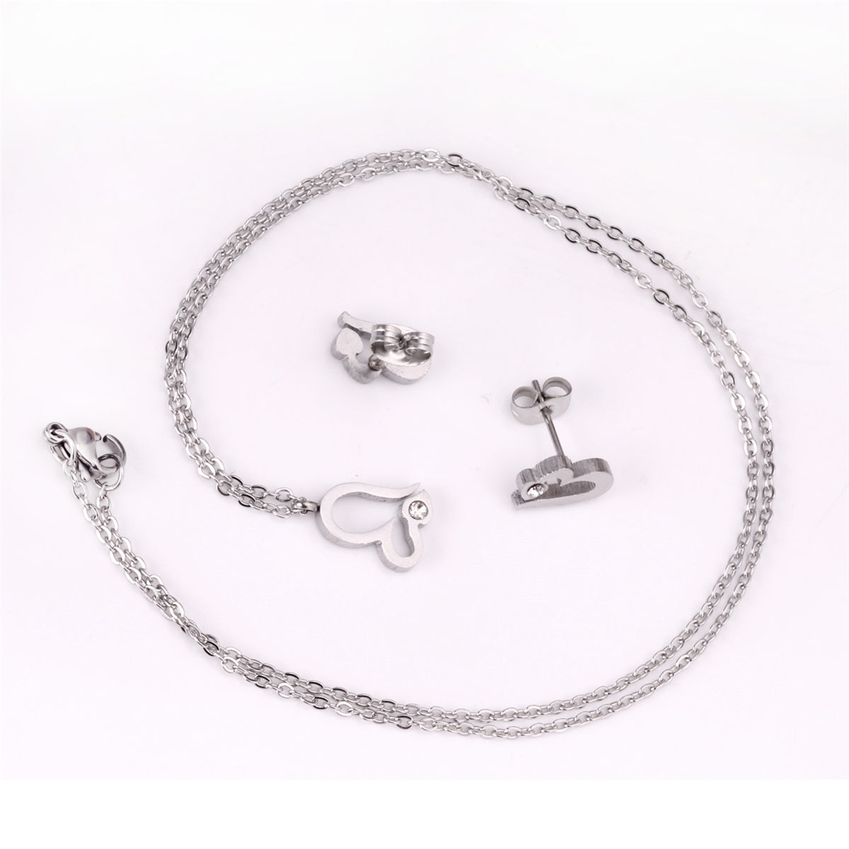 Clear Cubic Zirconia and Silver-Plated Heart Stud Earrings and Pendant Necklace, silver stud earrings for..., lifestyle look