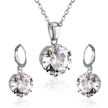 Cubic Zirconia and Silver-Plated Drop Huggie Earrings and Pendant Necklace, silver huggie earrings, front view