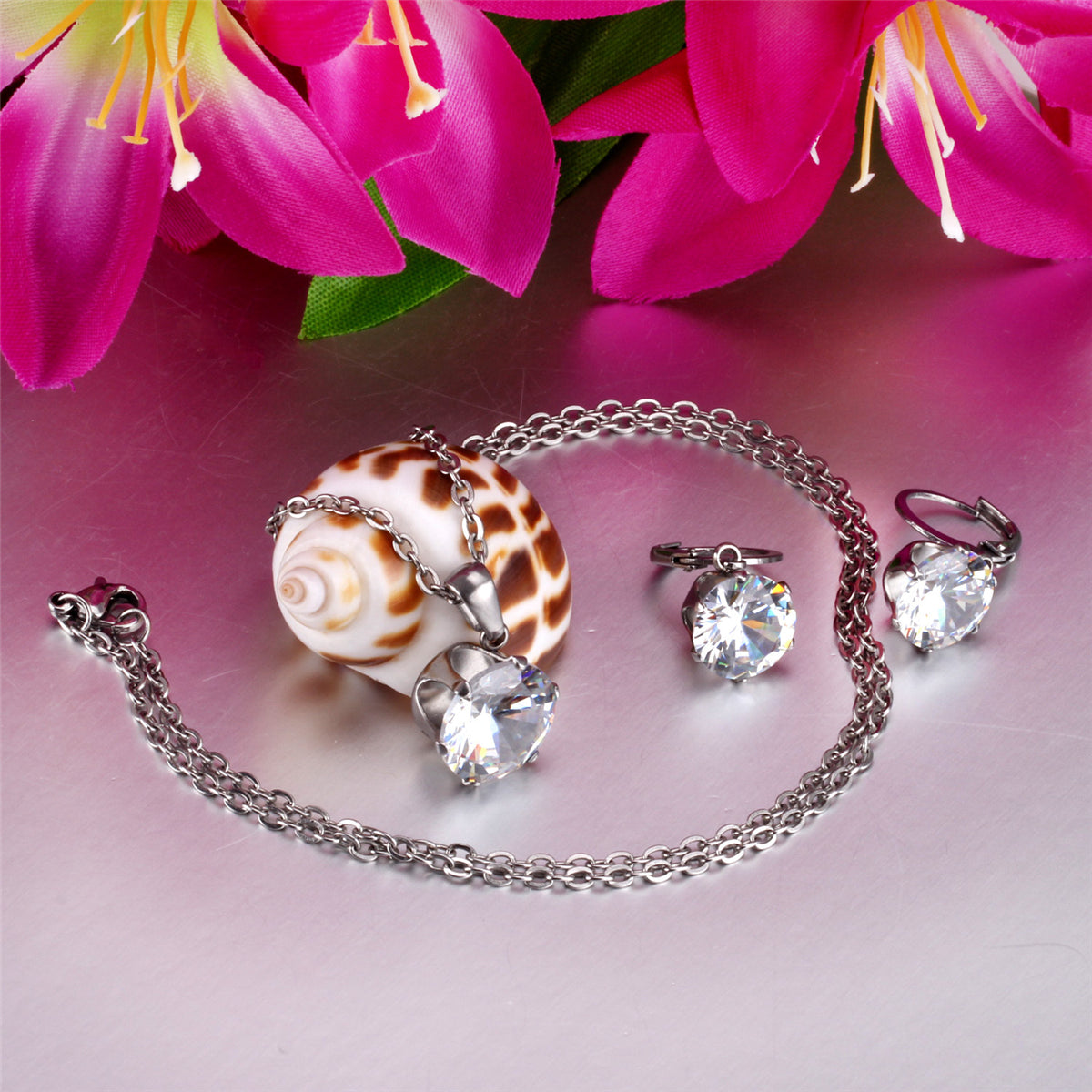 Cubic Zirconia and Silver-Plated Drop Huggie Earrings and Pendant Necklace, silver huggie earrings, side view