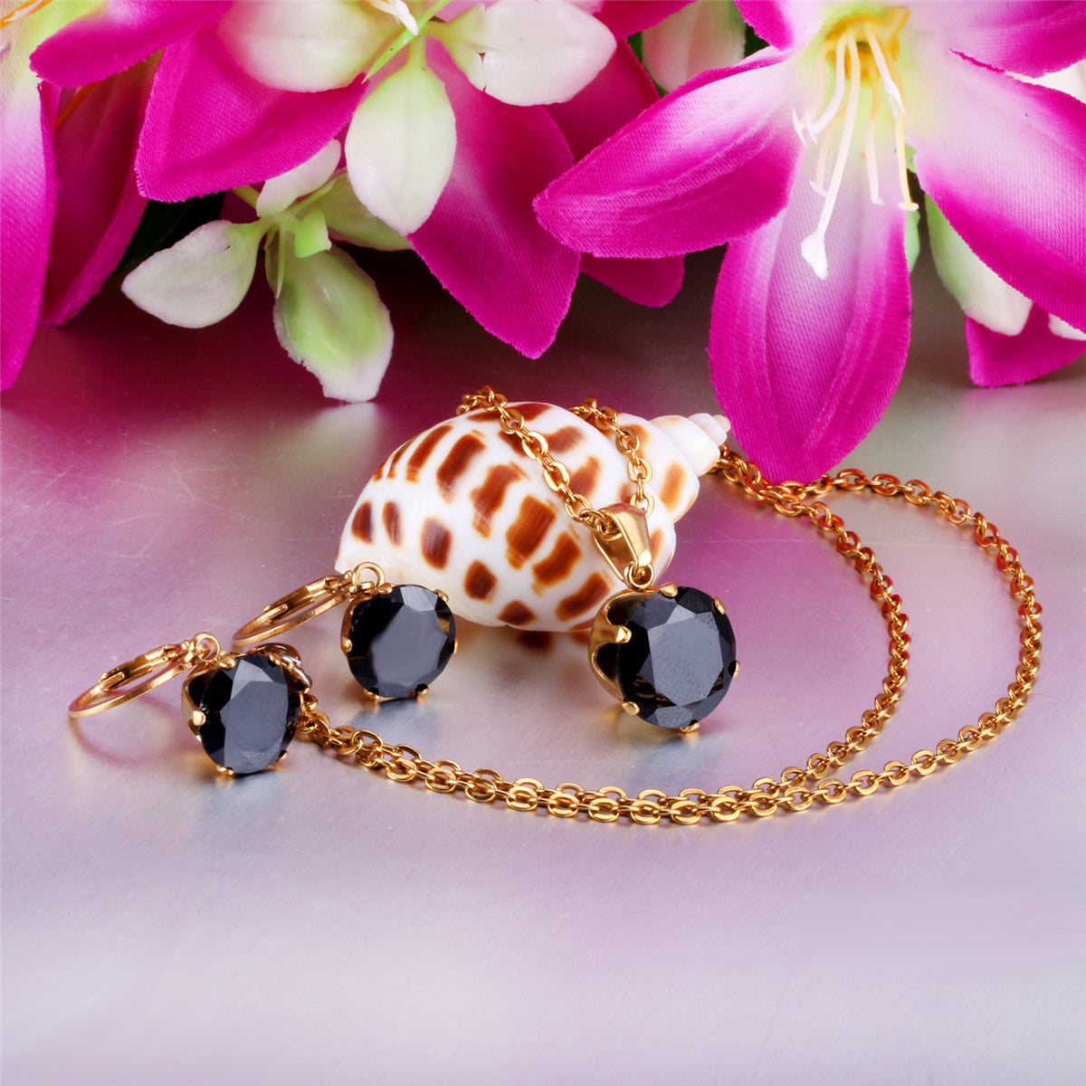 Black Cubic Zirconia and 18K Gold-Plated Huggie Earrings and Pendant Necklace, gold huggie earrings, side view