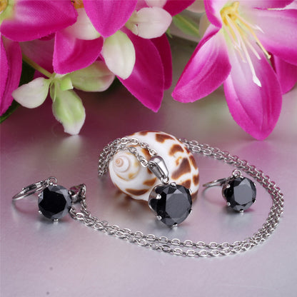 Black Cubic Zirconia and Silver-Plated Round Pendant Necklace and Huggie Earrings, silver huggie earrings, side view