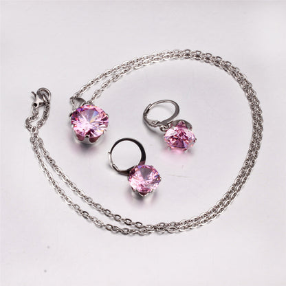 Pink Cubic Zirconia and Silver-Plated Huggie Earrings and Pendant Necklace, silver huggie earrings, side view
