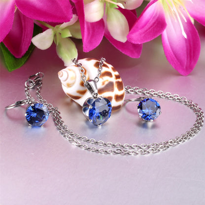 Blue Cubic Zirconia and Silver-Plated Huggie Earrings and Pendant Necklace, silver huggie earrings, side view