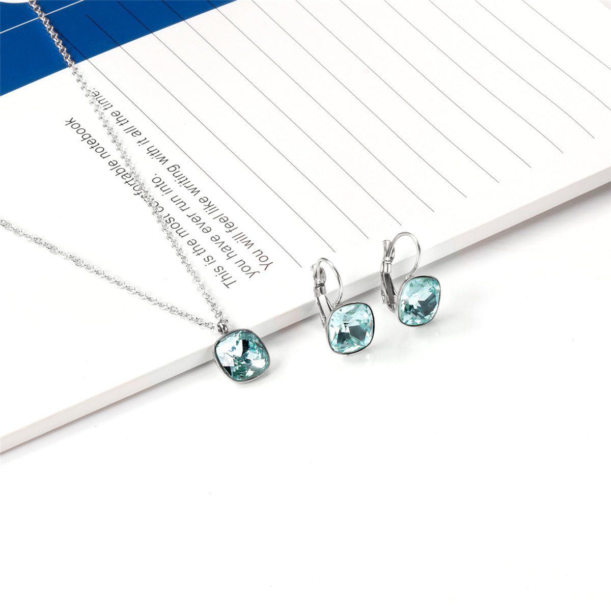 Lake Blue Crystal and Silver-Plated Square Huggie Earring Set, silver huggie earrings, vintage-inspired design, side view