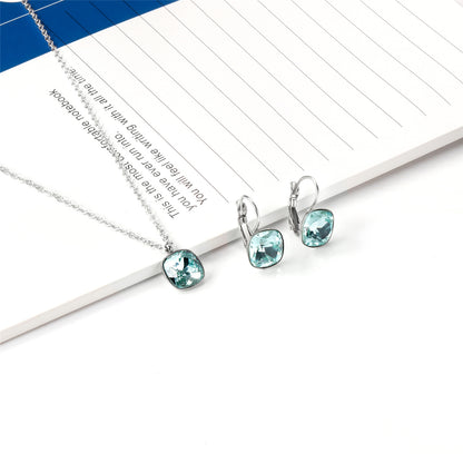 Lake Blue Crystal and Silver-Plated Square Huggie Earring Set, silver huggie earrings, vintage-inspired design, side view