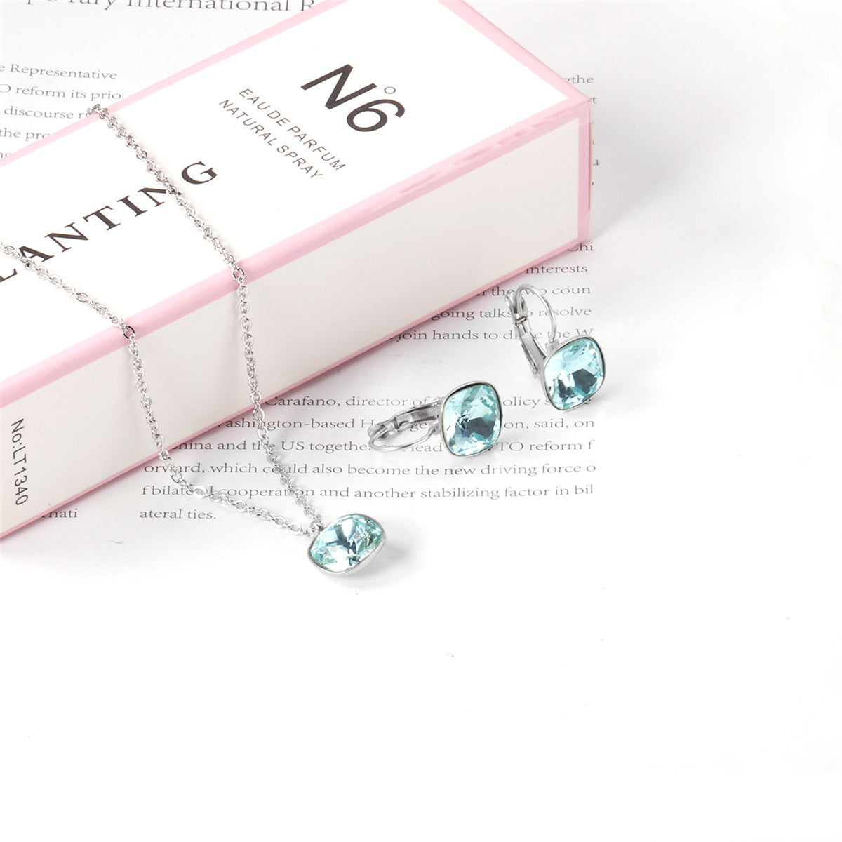 Lake Blue Crystal and Silver-Plated Square Huggie Earring Set, silver huggie earrings, detail close-up
