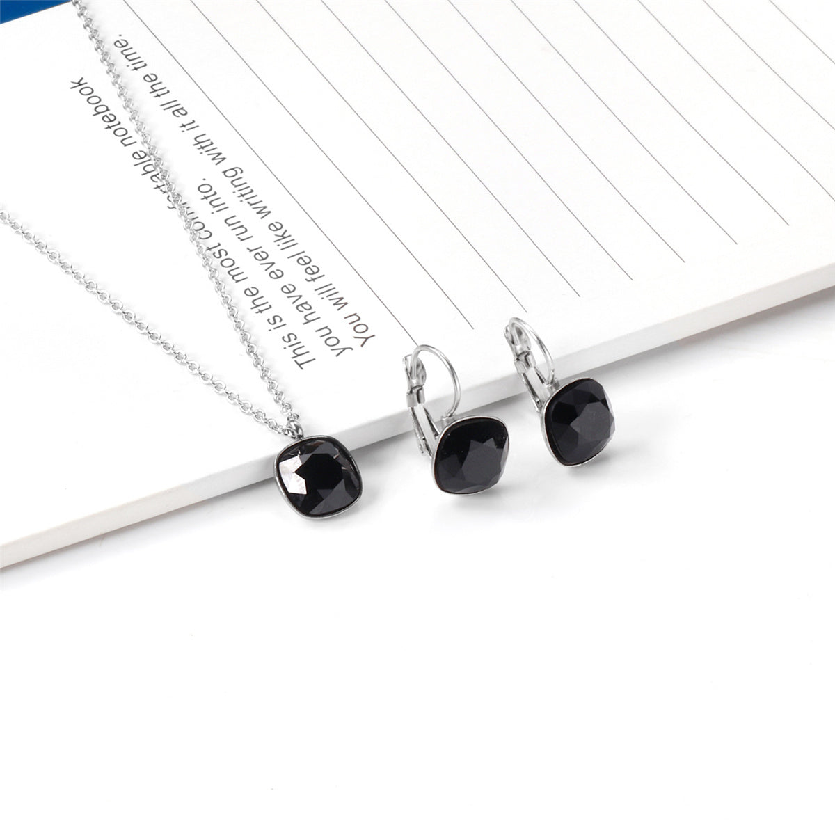 Black Crystal and Silver-Plated Square Pendant Necklace and Huggie Earrings, silver huggie earrings, detail close-up