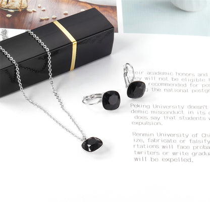 Black Crystal and Silver-Plated Square Pendant Necklace and Huggie Earrings, silver huggie earrings, side view