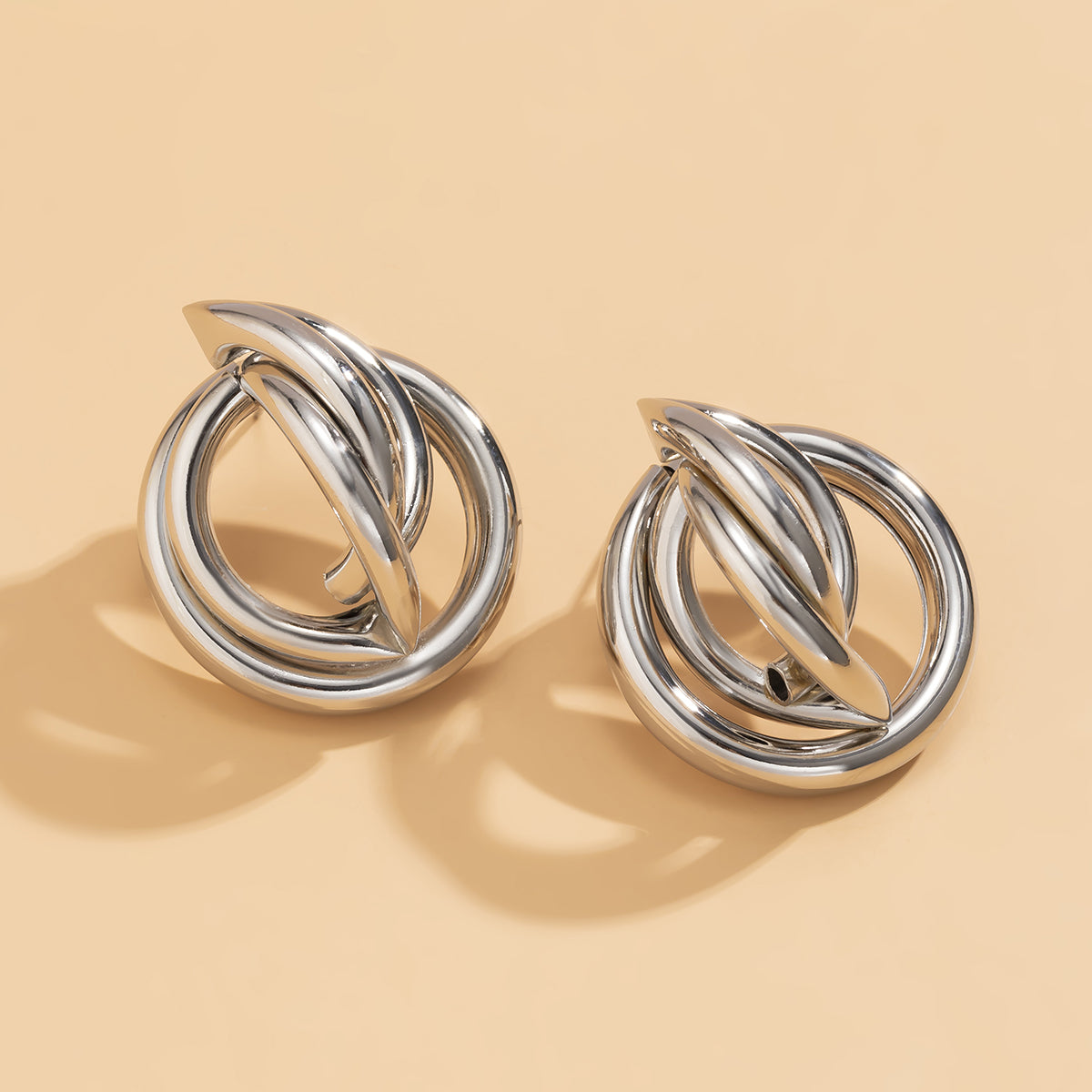 Silver-Plated Interlocking Rings Stud Earrings, silver stud earrings for women, everyday style, detail close-up