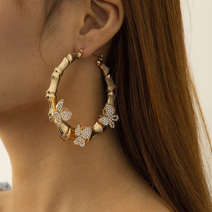 Cubic Zirconia and 18K Gold-Plated Butterfly Bamboo Hoop Earrings, botanical inspired, front view