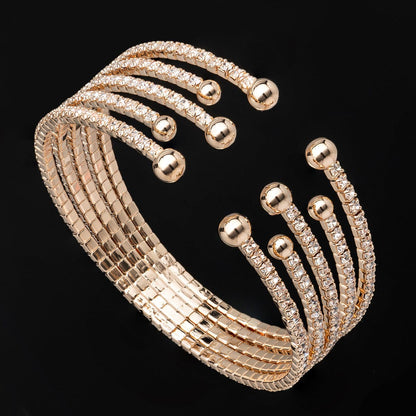 Cubic Zirconia and 18K Gold-Plated Bead End Cuff, gold bracelet for women, dainty minimalist design, detail close-up