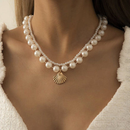 Pearl and 18K Gold-Plated Shell Layered Necklace, gold pendant necklace for women, vintage-inspired design, front view